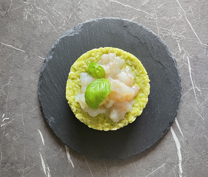 Risotto con crema di zucchine e scampi